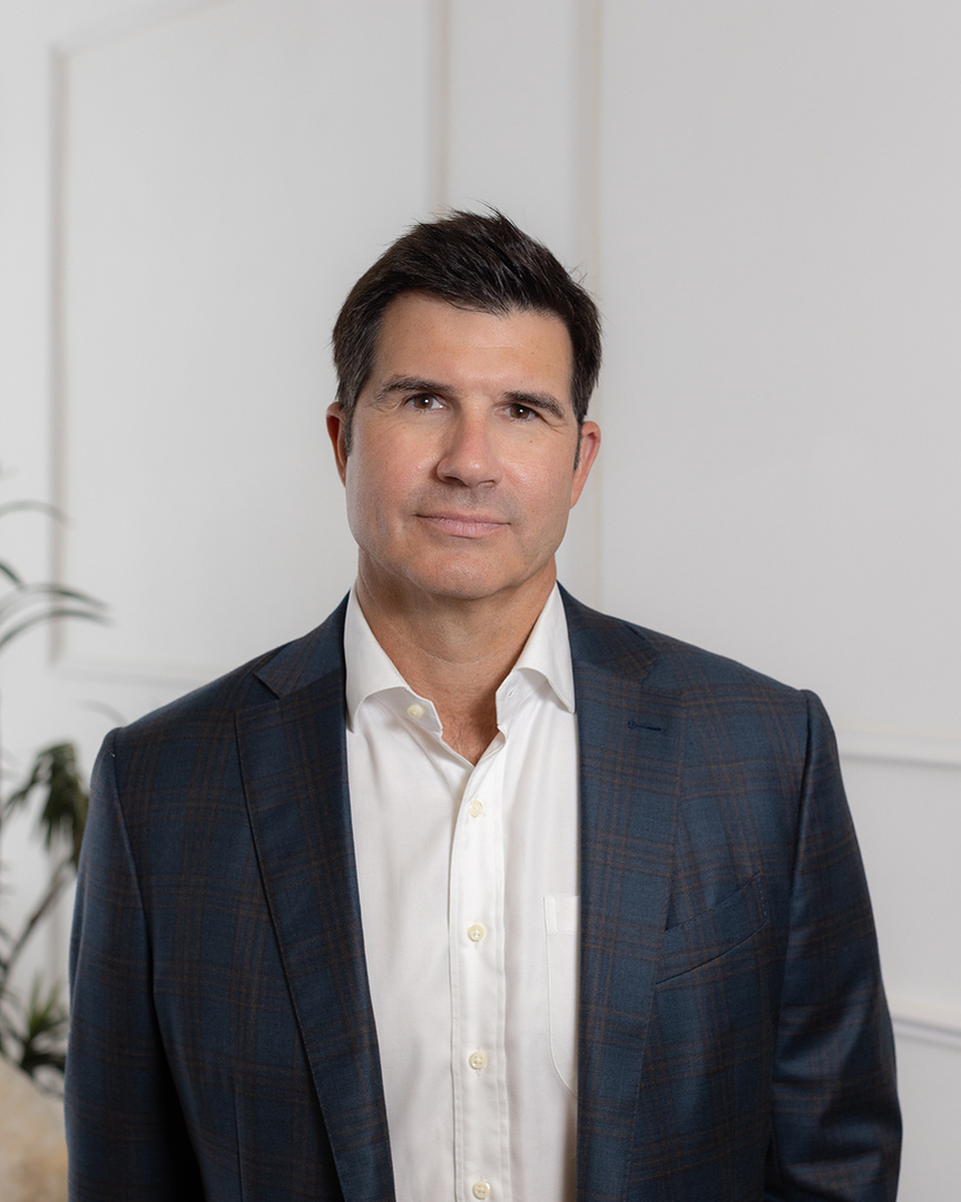 A sharp, high-quality headshot captured by a professional Atlanta-based photographer, showcasing a confident business professional.