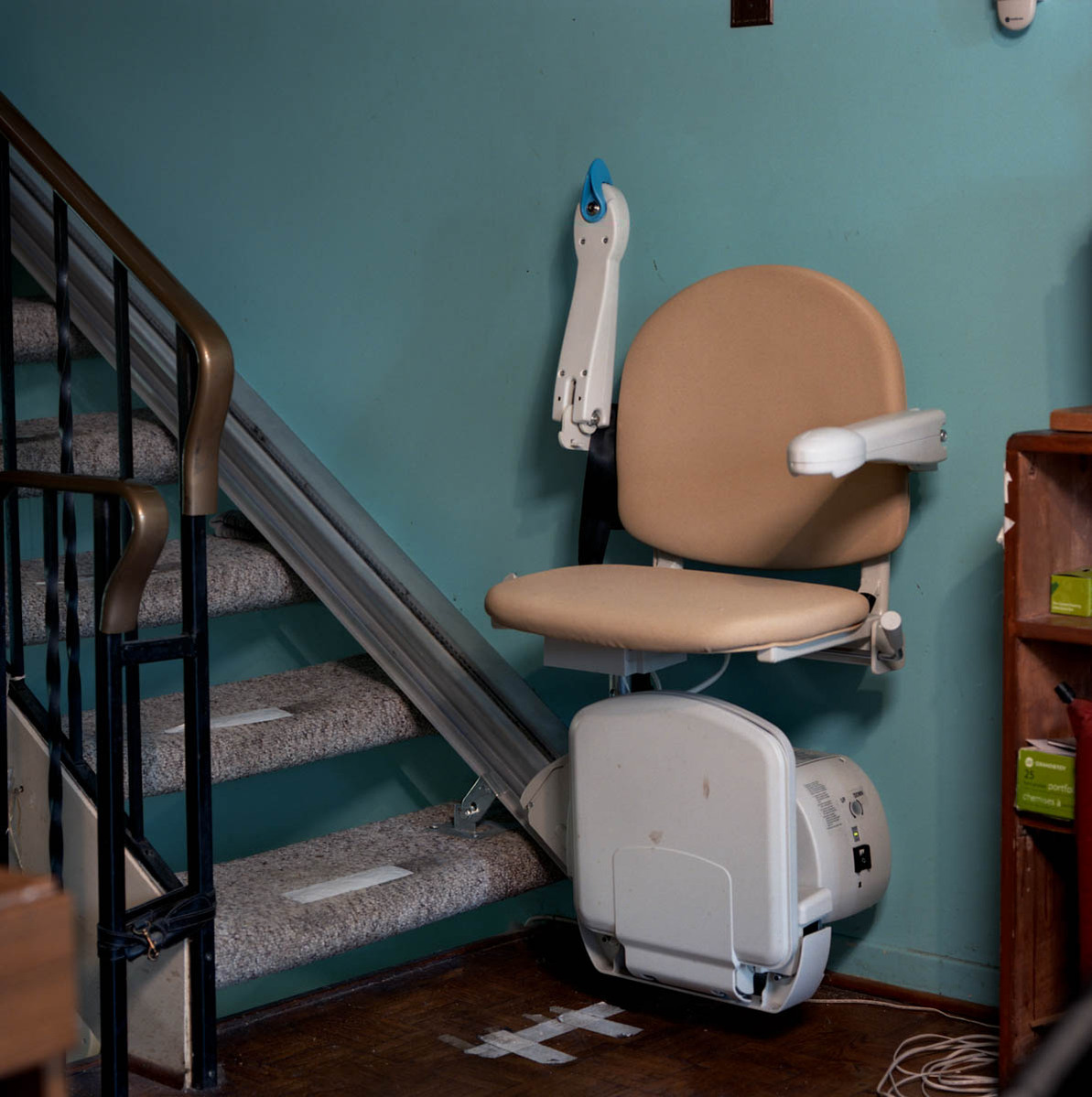 a stair climbing assistance devise installed in a senior's home; part of a series on Medical Assistance in Dying