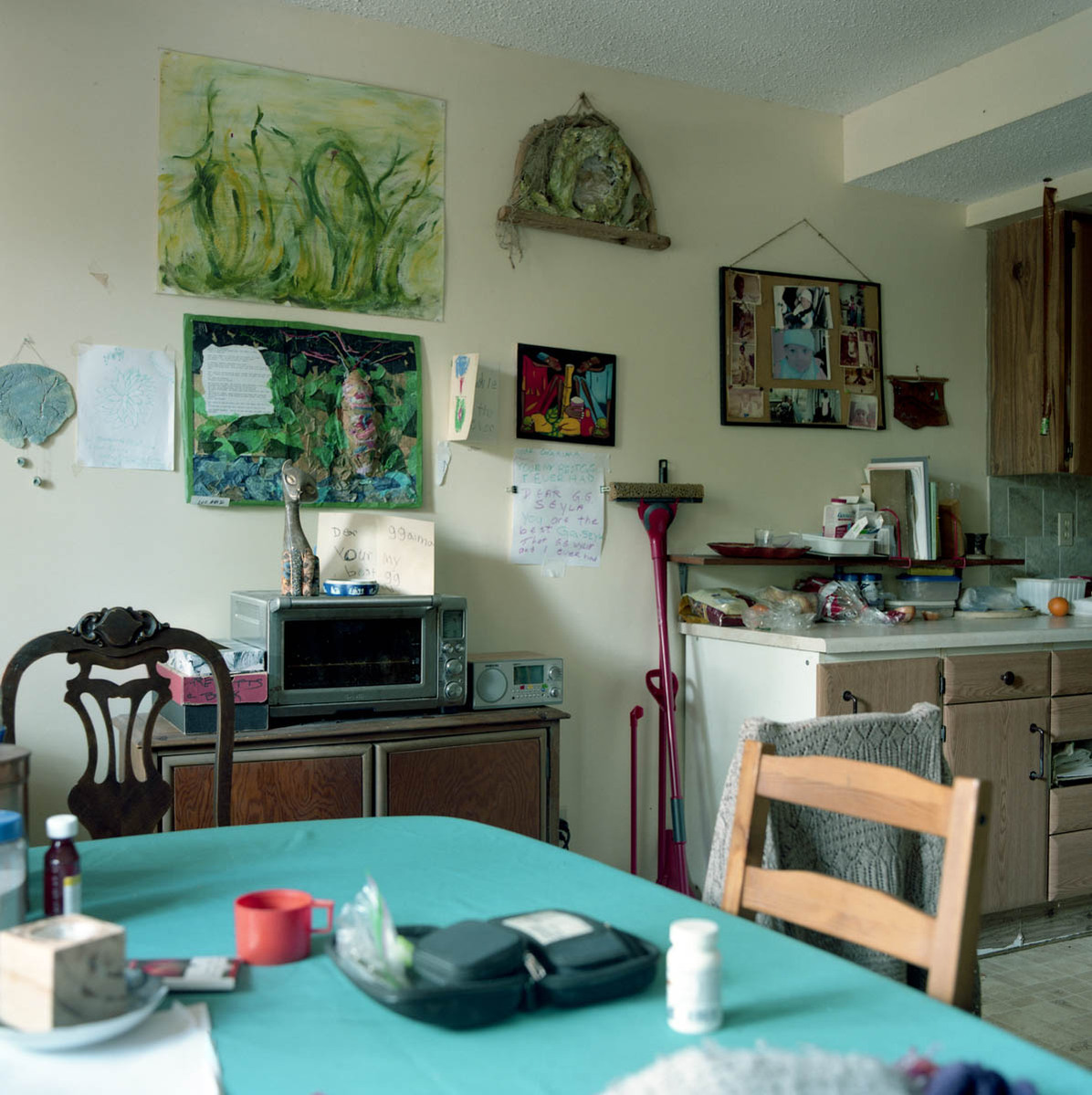 the kitchen and dining table of a senior's modest home; part of a series on Medical Assistance in Dying