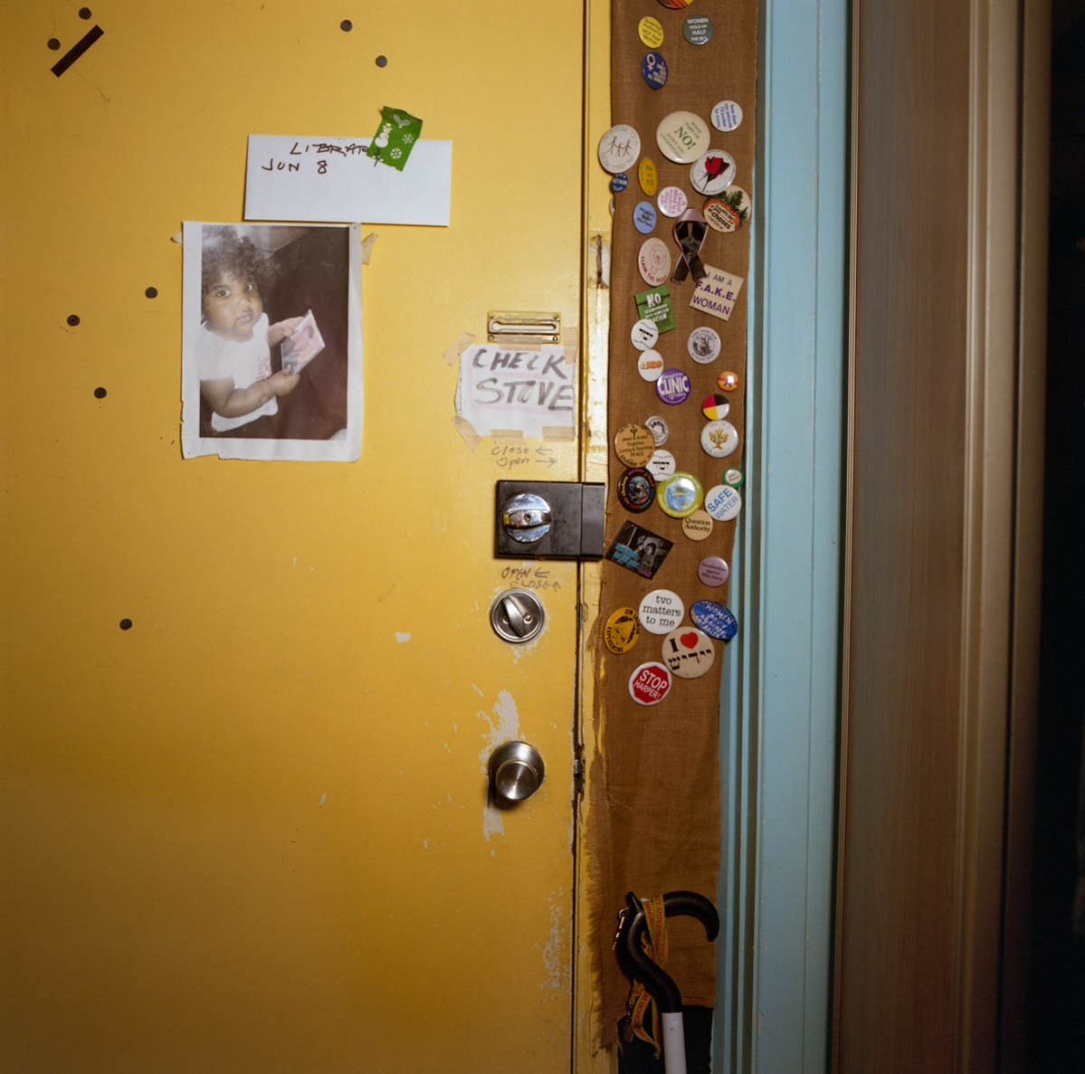 the front door to the house with reminders and photos attached to it; part of a series on Medical Assistance in Dying