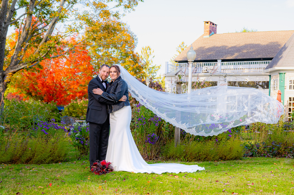 A flowing veil with a picturesque backdrop of the venue.