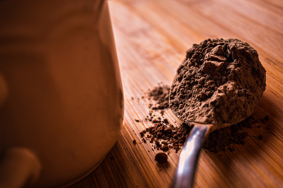 Closeup of cocoa powder on spoon 