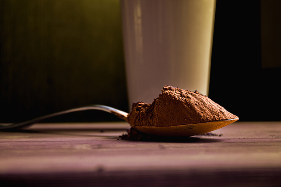 Closeup of cocoa powder on spoon  