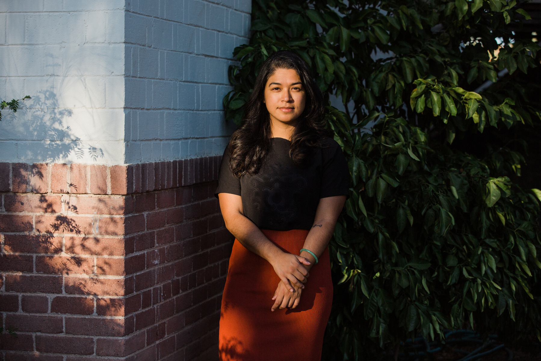Community organizer with Puente Human Rights Movement Máxima Guerrero stands for a portrait on June 17 near her home in Phoenix, Ariz. Guerrero, a DACA recipient, was arrested as she was leaving a Black Lives Matter protest in the early hours of May 31, t