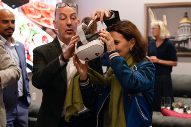 Guests examining a product at a corporate tasting event