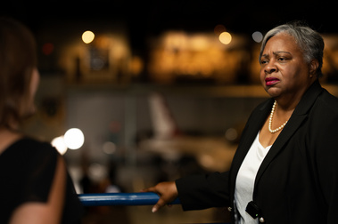 Attendee at an evening awards and recognition gala