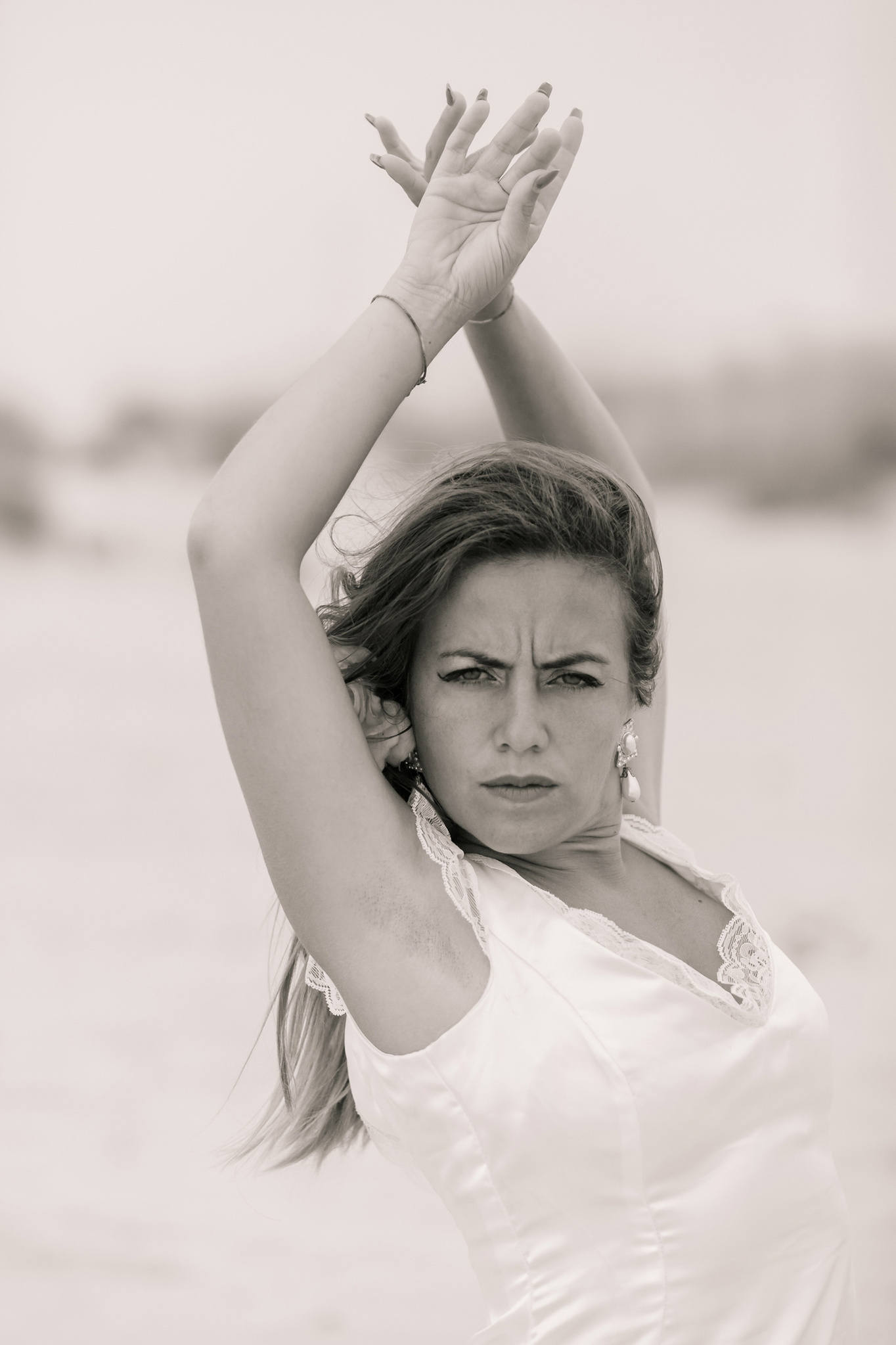 Portrait of flamenco dancer on the beach in Cádiz, Andalusia, Spain. 