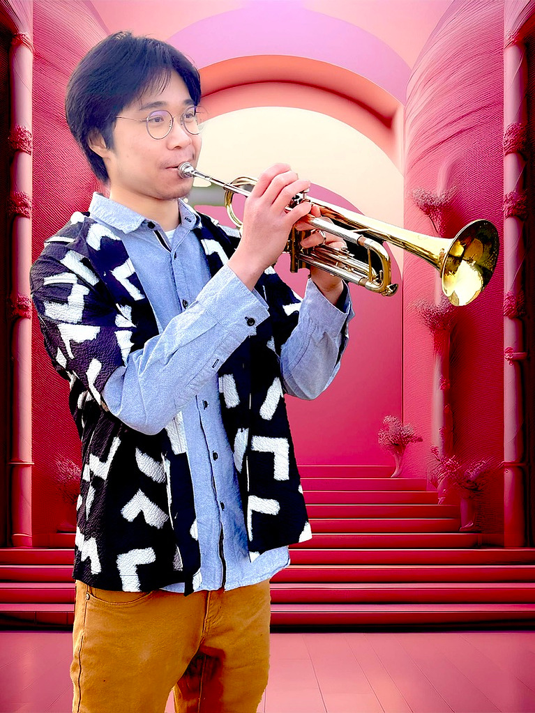 Boy with trombone against pink stage