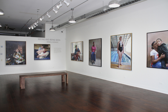 Gallery in Chicago with paintings on the wall