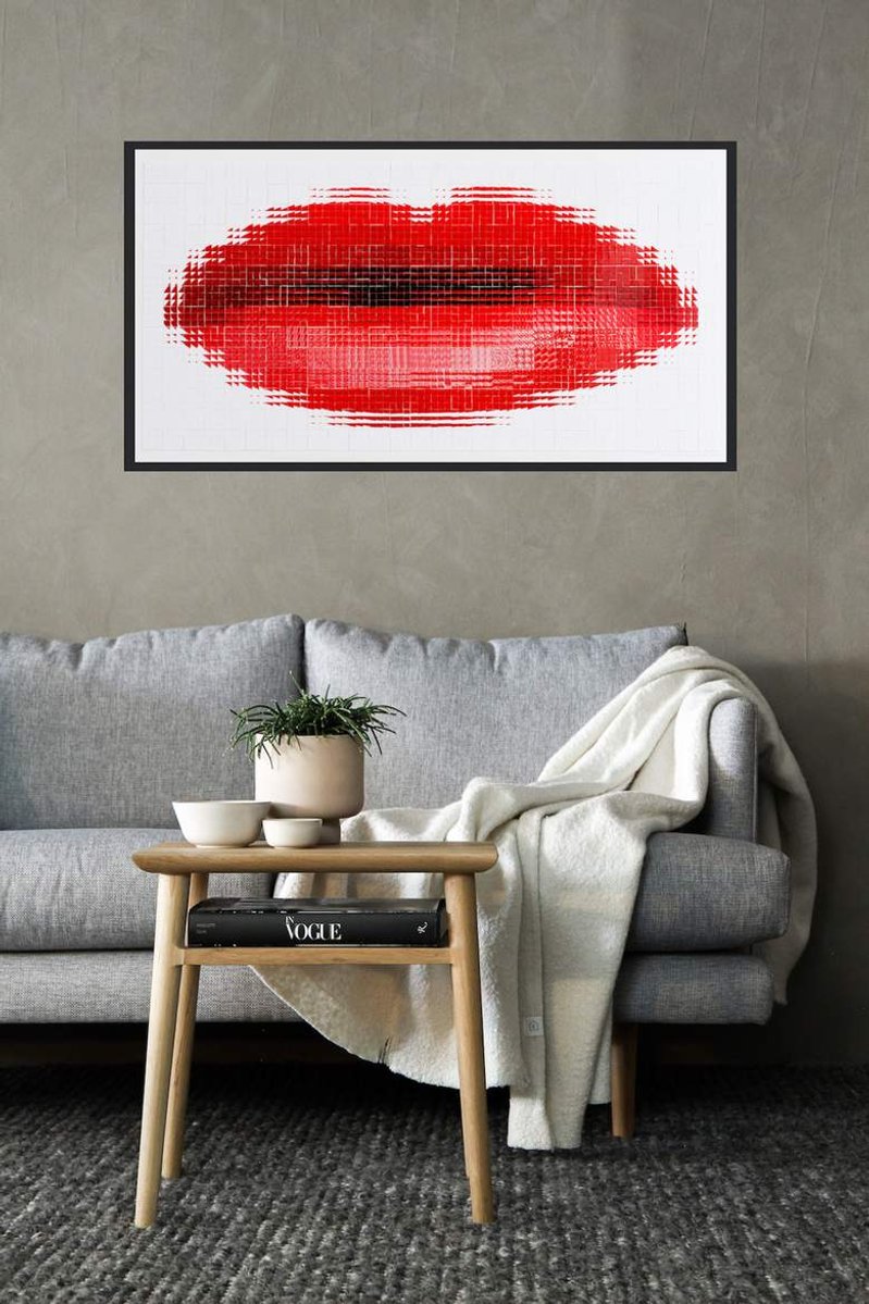 In-situ art, living room, grey wool couch and wall, throw rug. Pout #4 large collage of photographs of the artist's red lips wearing lipstick forming one large mouth on white background. By Tasmanian contemporary visual artist Di Allison HALLISON Studios.