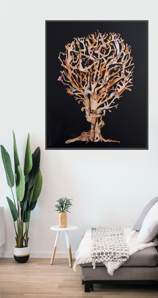 Art in-situ in living room with green pot plants. Hand Hold, large contemporary art collage by HALLISON Studios, hands & arms from fashion magazines Vogue, Harpers Bazaar, Elle, Marie Claire, Net-a-Porter, form a tree on a black background.