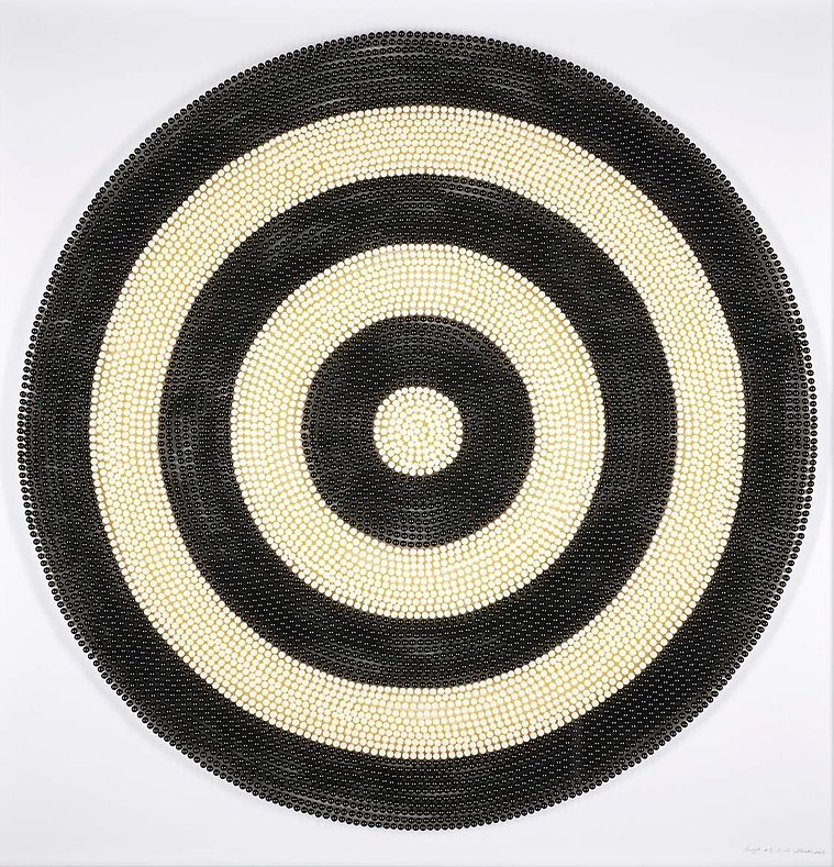 Target #3, an artwork by Tasmanian contemporary artist Di Allison, HALLISON Studios, Tasmania, online gallery, using empty pill capsules in white and black to form a large circular target, Pop Art like.