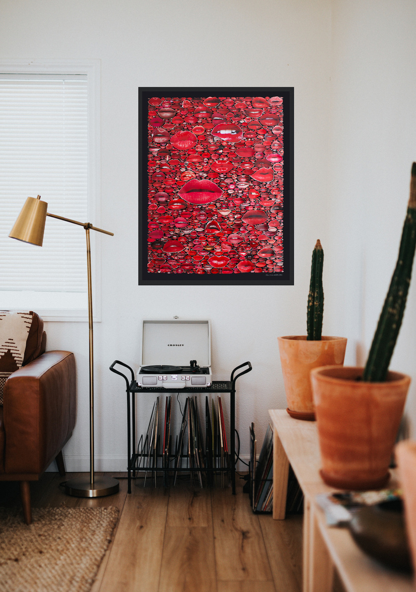 In-situ of large contemporary art collage entitled Gloss by Tasmanian visual artist Diane Allison of HALLISON Studios featuring hundreds of red pouting lips from magazines against a black ground, on a white wall in a living room with record player.