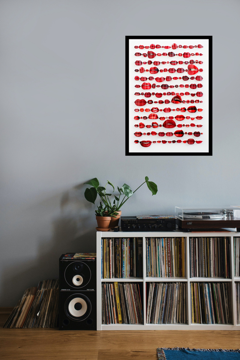 In-situ art, vinyl records in a living room. Speechless, contemporary art work of red lips from fashion magazines Vogue, Elle, Harpers Bazaar and Net-a-Porter.  Pinned in rows like specimens, white background. By Diane Allison HALLISON Studios Tasmania.