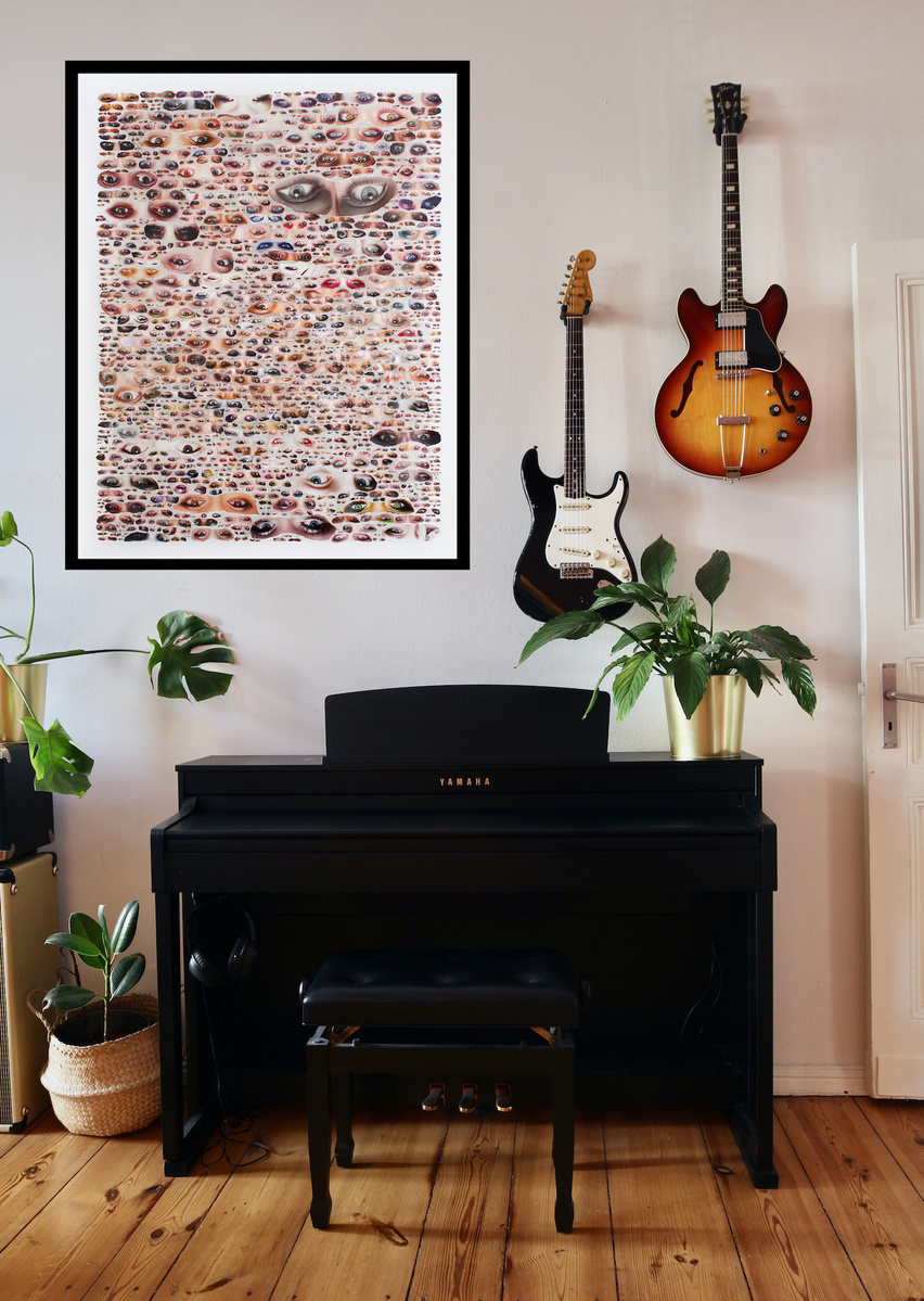 Large collage artwork by Tasmanian contemporary artist Diane Allison of HALLISON Studios of dozens of hand torn images of underside down eyes from fashion magazines ground entitled Glare. Art in-situ in an apartment music room with piano, guitars & plants