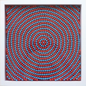 Contemporary art by Di Allison, HALLISON Studios, Tasmania, online gallery. Empty pill capsules arranged in concentric circles, op art / Pop art-like, in colours of red and blue. Entitled Radiate #2.