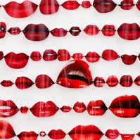 Close up image of Speechless, contemporary art work of red lips from fashion magazines Vogue, Elle, Harpers Bazaar and Net-a-Porter. They are pinned in rows like specimens on a white background. Visual artist Diane Allison, HALLISON Studios, Tasmania.