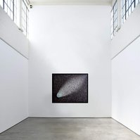 Dust to Dust is a large collage by visual artist Di Allison HALLISON Studios, Tasmania.  Contemporary art featuring a National Geographic magazine world map ripped into small pieces like a comet in a night sky. In-situ on an industrial white gallery wall.
