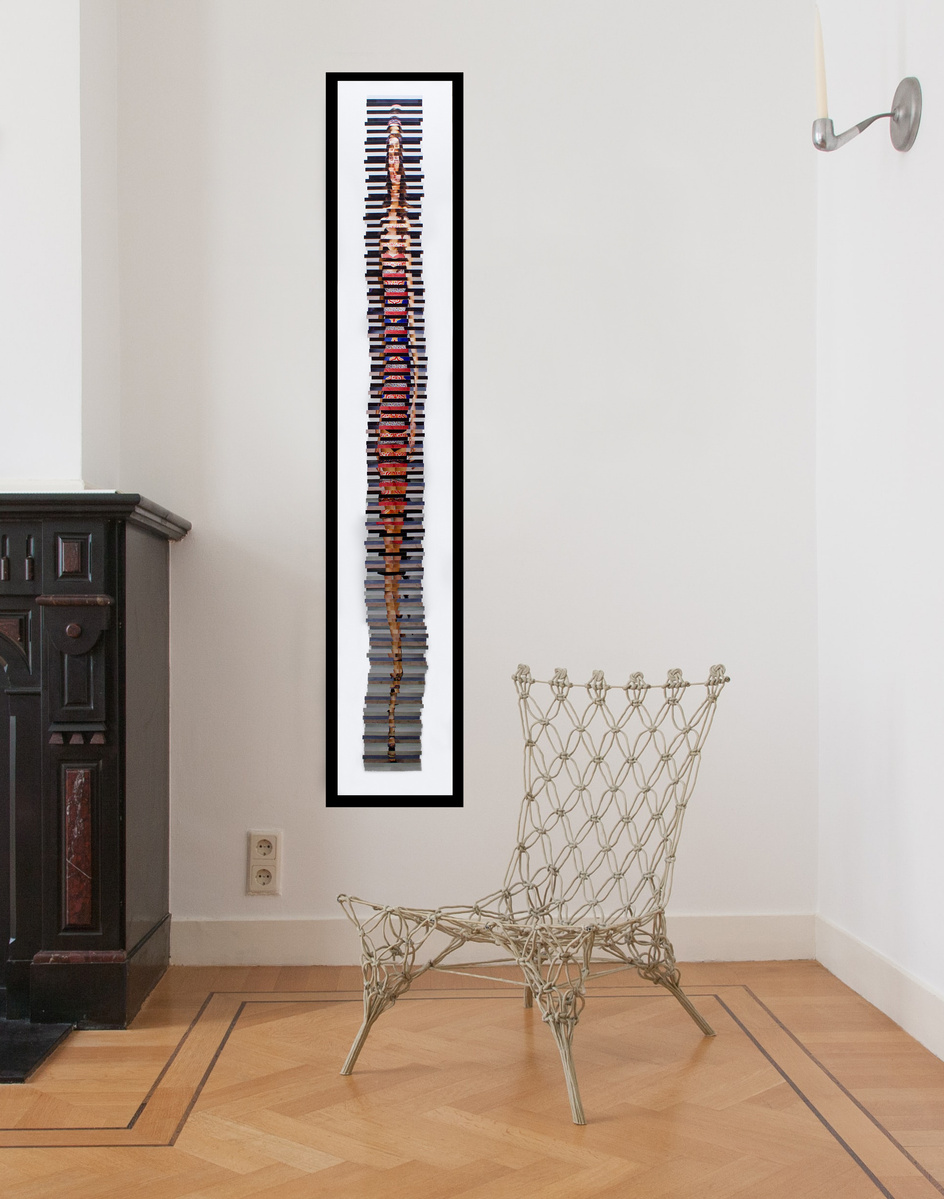 Five Foot Nine 5'9 is a collage of sliced photographic self portraits in catwalk poses arranged to the height of a fashion model. In-situ in a living room next to a wire chair. Visual art by artist Diane Allison, HALLISON Studios, Tasmania/lutruwita