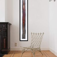 Five Foot Nine 5'9 is a collage of sliced photographic self portraits in catwalk poses arranged to the height of a fashion model. In-situ in a living room next to a wire chair. Visual art by artist Diane Allison, HALLISON Studios, Tasmania/lutruwita