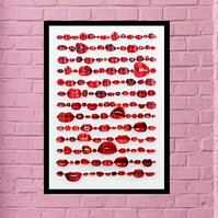 In-situ art on pink brick wall. Speechless is a contemporary art work of red lips from fashion magazines Vogue, Elle, Harpers Bazaar and Net-a-Porter.  Pinned in rows like specimens, white background, visual artist Diane Allison HALLISON Studios Tasmania.