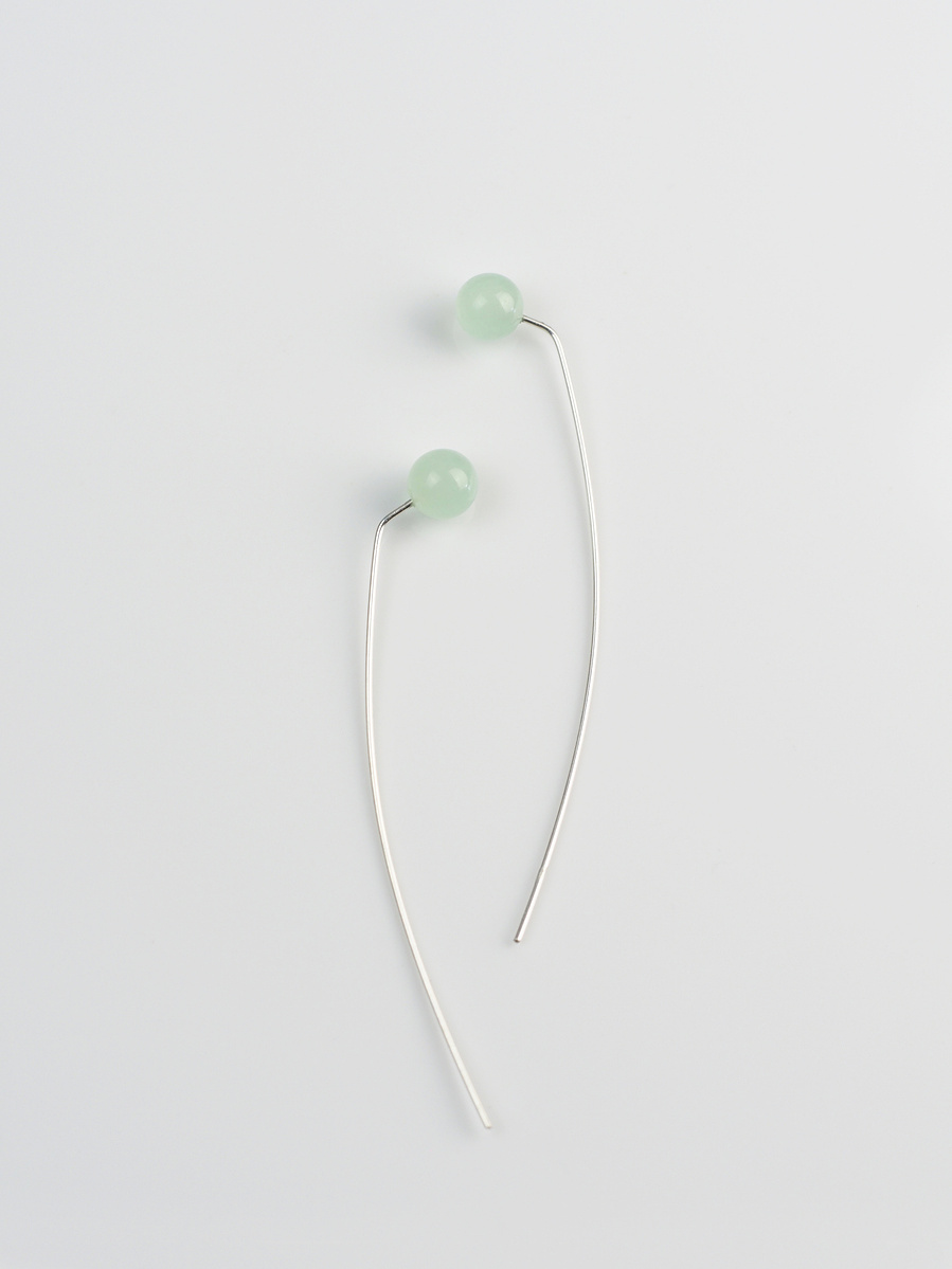 Contemporary minimalist earrings of green agate and sterling silver by jeweller Di Allison of HALLISON Studios, Tasmania, entitled Highlands: Bend suggestive of the button grass of the Tasmanian Central Highlands.