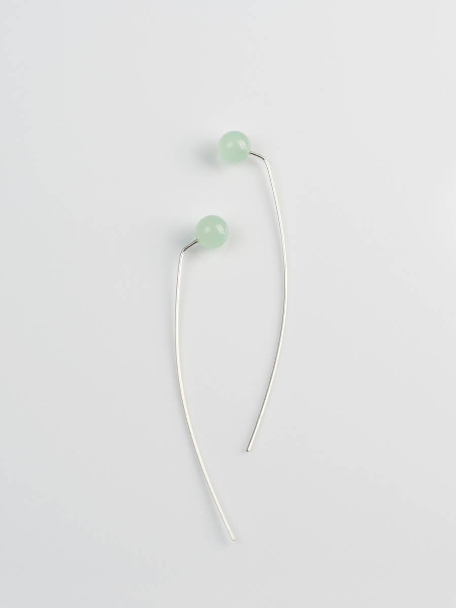 Contemporary minimalist earrings of green agate and sterling silver by jeweller Di Allison of HALLISON Studios, Tasmania, entitled Highlands: Bend suggestive of the button grass of the Tasmanian Central Highlands.