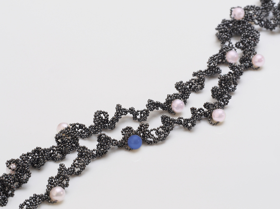 Orbit: a series of Lunar inspired necklaces with 12 pearls or gemstones entwined on a midnight sky of oxidised sterling silver orbiting the wearer handmade by contemporary jeweller Di Allison, HALLISON Studios, Tasmania. Includes Blue Moon and Blood Moon.