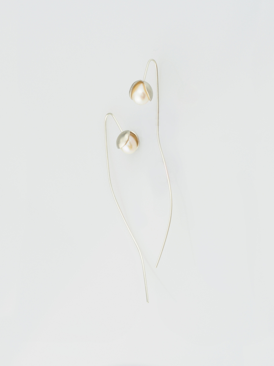 Flower bud like, botanical inspired sterling silver and freshwater pearl minimalist, stem earrings entitled Sweet Pea by contemporary jeweller Di Allison, HALLISON Studios, Tasmania.