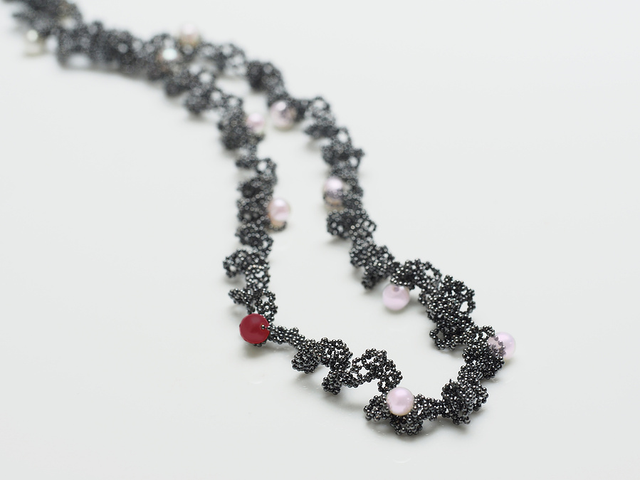 Orbit: a series of Lunar inspired necklaces with 12 pearls or gemstones entwined on a midnight sky of oxidised sterling silver orbiting the wearer handmade by contemporary jeweller Di Allison, HALLISON Studios, Tasmania. Includes Blue Moon and Blood Moon.