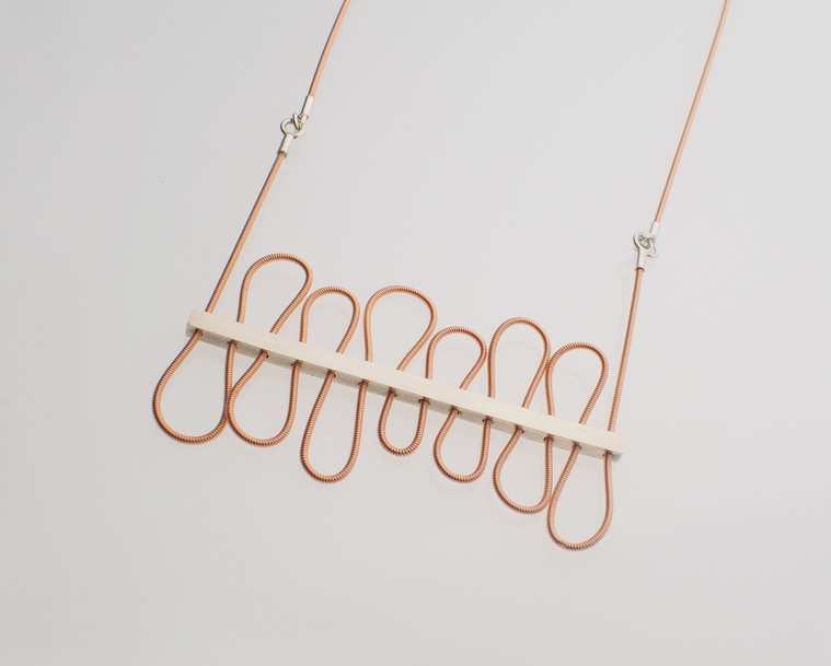 Groove is in the Heart pendant inspired by music, lyrics, the Deee-lite pop song. Made of guitar strings and sterling silver by jeweller Di Allison, HALLISON Studios, Tasmania, online gallery store. Bijoux, jewelry, jewellery reminiscent of sound waves.