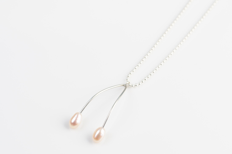 Wish pendant by contemporary jeweller Di Allison, HALLISON Studios, Tasmania, online gallery store. Freshwater pearls on long sterling stems, organic form inspired by wish bones