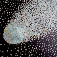 Close-up detail of Dust to Dust - a large collage by visual artist Di Allison, HALLISON Studios, Tasmania.  Contemporary art collage featuring a National Geographic magazine world map ripped into small pieces, arranged like a comet against a night sky. 