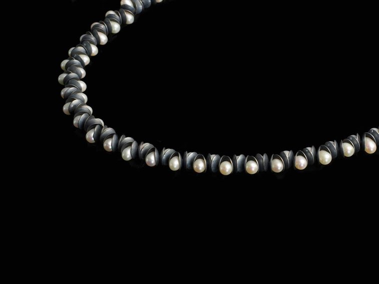 Nestle Luminous necklace, contemporary jewellery by artist Di Allison, HALLISON Studios, Tasmania online gallery store. Oxidised sterling silver, domed white freshwater pearls.