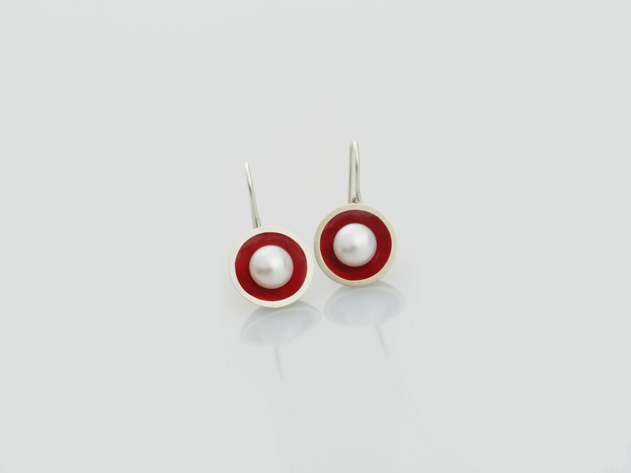 Classic and contemporary connect in these round sterling silver and kiln fired red vitreous enamel earrings, set with luminous freshwater pearls by jeweller Diane Allison, HALLISON Studios, Tasmania, from the Connect the Dots collection.
