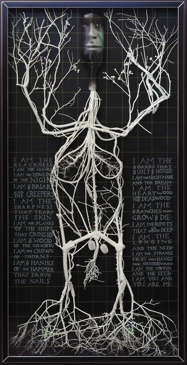 Contemporary artwork by artist Patrick Hall, HALLISON Studios, Tasmania, online gallery. The Longing is a sculpture with engraved glass text, poetry.  A man of white twigs and branches with a glowing bottle head and face, ghostly, like an ancient spirit