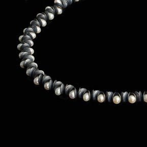 Nestle Luminous necklace, contemporary jewellery by artist Di Allison, HALLISON Studios, Tasmania online gallery store. Oxidised sterling silver, domed white freshwater pearls.