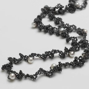 Orbit necklace, inspired by the full moon on a night sky, contemporary jewellery jewelry by Di Allison, HALLISON Studios, online gallery store,Tasmania features white pearls on a strand of black oxidised sterling silver.