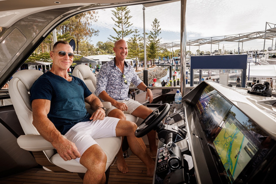In the Princess Yachts Y72 cockpit at the Sanctuary Cove International Boat Show. Boat show event photography by boat show  and yacht photographer Darren Gill.