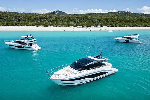 Princess Yachts anchored up during the Princess Yachts Owners Rendezvous at Whitehaven Beach QLD Australia. Photography by Darren Gill.