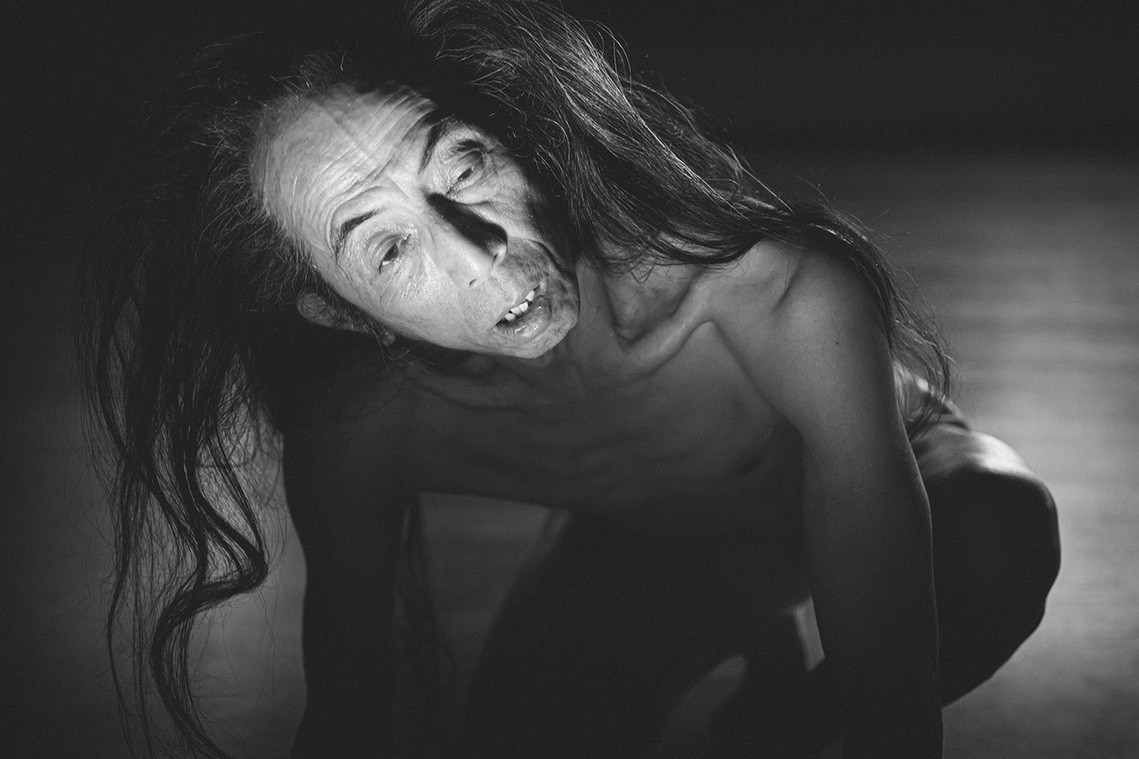 Master Japanese Butoh artist performer dancer Atsushi Takenouchi during his work HANA. Butoh photography by Butoh dance photographer Darren Gill