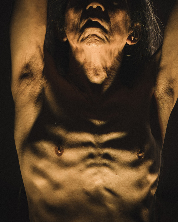 Butoh master Atsushi Takenouchi during his work HANA. Photographed by Butoh dance photographer Darren Gill