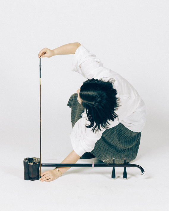 Composer and musician Jasmin Wing-Yin Leung with her erhu for Darebin Arts SoeakEasy at Darebin Arts Centre. Art music photography by Melbourne art music photographer Darren Gill