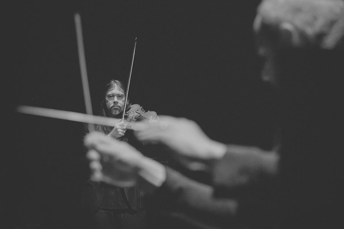 Violist and composer Aaron Wyatt performing Digital Echoes for Speak Percussion at ArtsHouse during the Melbourne Fringe Festival. Art Music photography documentation by Melbourne photographer Darren Gill