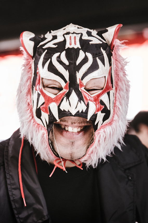 Osaka teenager in mask portrait photograph. Elderly Japanese person walking in Arashiyama, Kyoto Japan. Photography by Darren Gill.