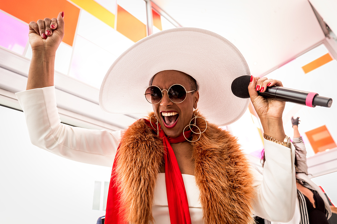 Sheba Williams performing inside the Mumm Yacht Club Birdcage for Mumm Champagne at the Melbourne Cup