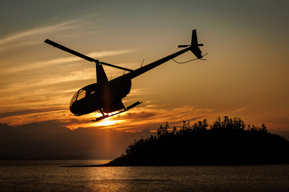 Sunset helicopter flights during the Princess Yachts Owners Rendezvous at Hayman Island QLD Australia. Photography by Darren Gill.