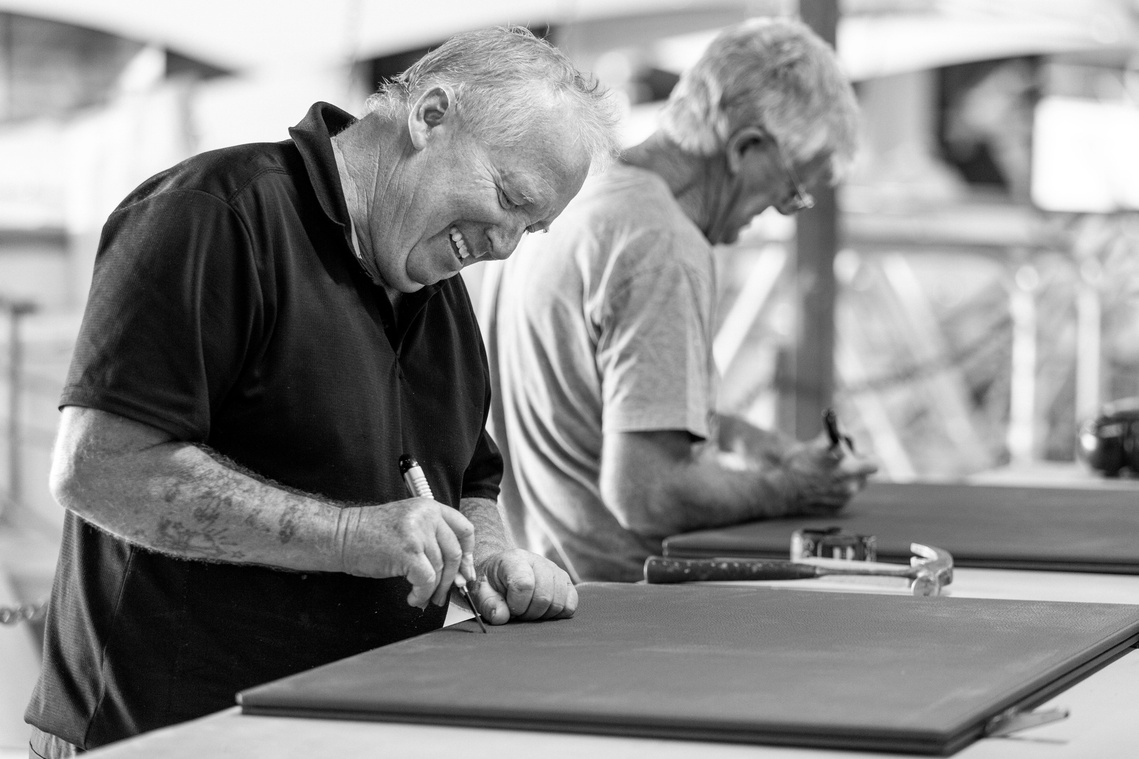Maritimo Yachts factory production team working on yacht upholstery. Photography by Darren Gill