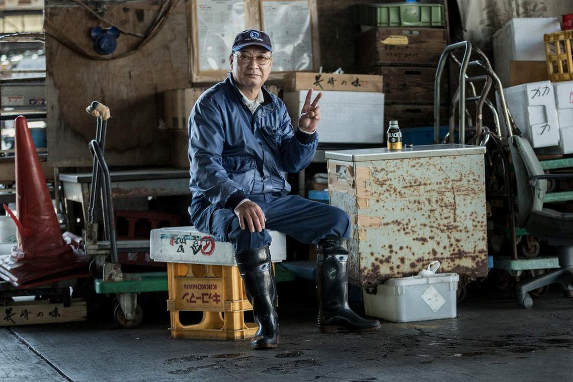 Portrait of Japanese fisherman worker at Tsukiji Fish market in Tokyo Japan. Photography by Darren Gill