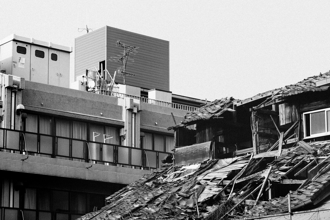 Run down collapsed building in Arashiyama, Kyoto Japan. Black and white photography by Darren Gill